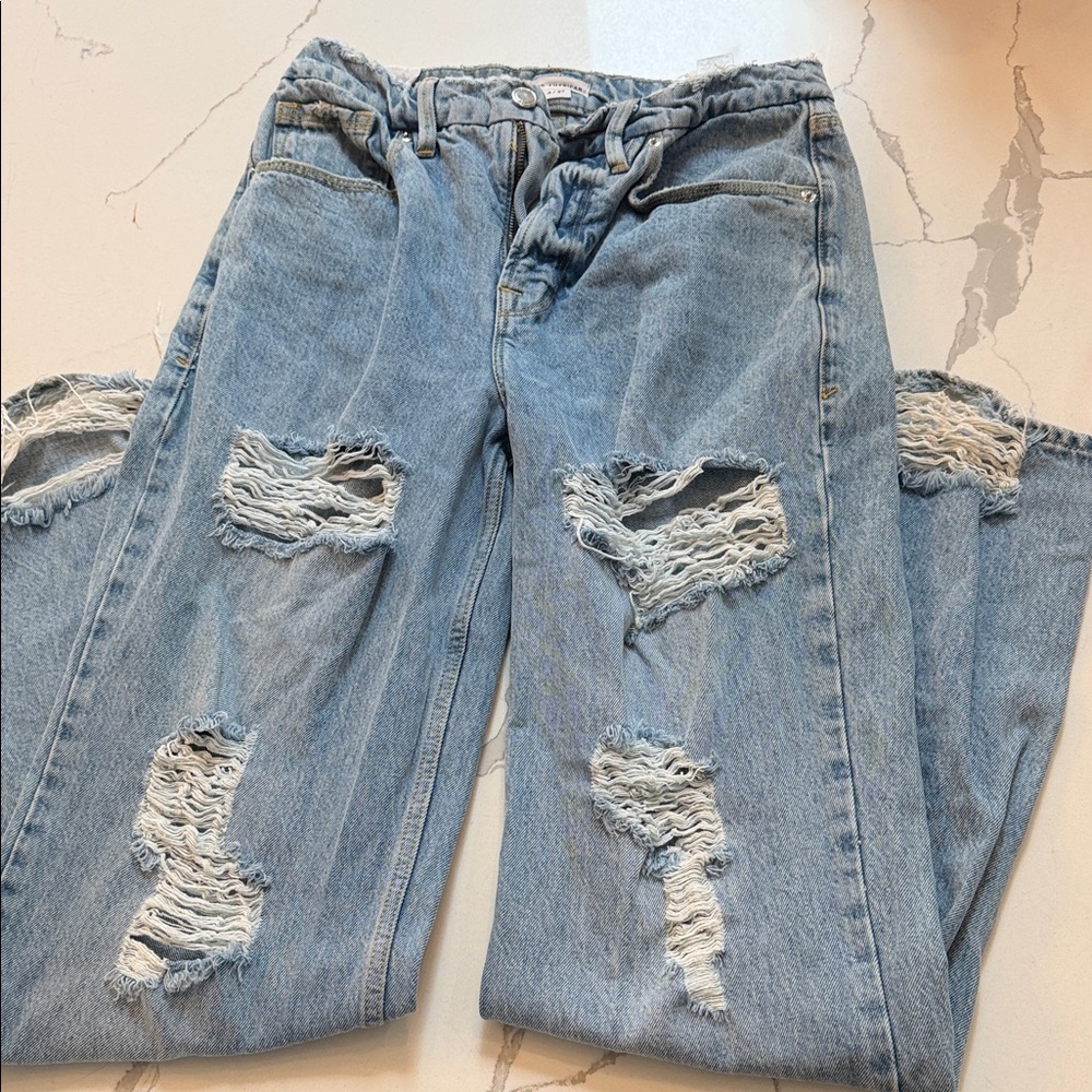 Distressed Blue Jeans